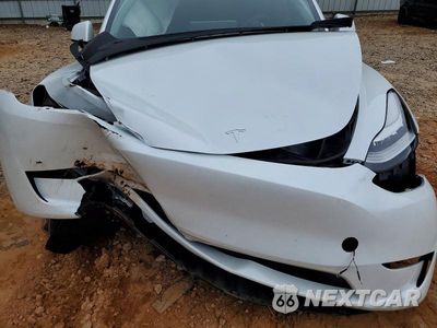 Zdjęcie 11 z 12 samochodu: 2023 TESLA MODEL Y VIN:7SAYGDEE5PA121029 - miniatura
