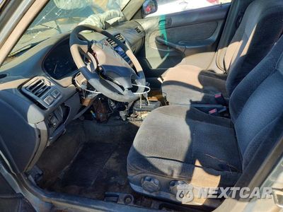 Zdjęcie 7 z 12 samochodu: 2000 HONDA CIVIC LX VIN:1HGEJ6672YL009398 - miniatura