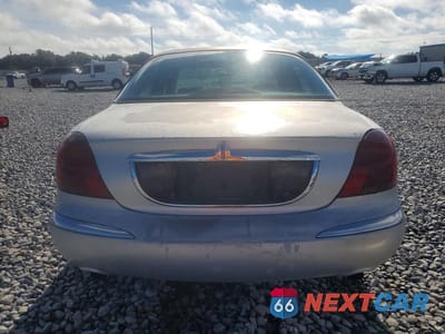 Zdjęcie 6 z 13 samochodu: 1998 LINCOLN CONTINENTAL VIN:1LNFM97V1WY694854 - miniatura