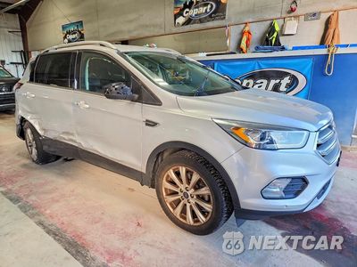 Czwarte zdjęcie samochodu z boku: 2017 FORD ESCAPE TITANIUM VIN:1FMCU9JD1HUF06444 - miniatura
