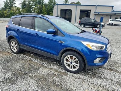 Czwarte zdjęcie samochodu z boku: 2018 FORD ESCAPE SE VIN:1FMCU0GD0JUB08036 - miniatura