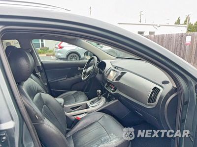 Piąte zdjęcie samochodu w środku: 2015 KIA SPORTAGE EX VIN:KNDPCCAC6F7718670 - miniatura