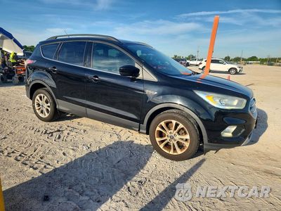 Czwarte zdjęcie samochodu z boku: 2017 FORD ESCAPE SE VIN:1FMCU0GD4HUA84186 - miniatura