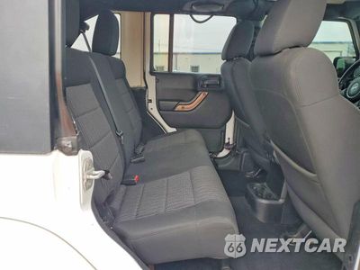 Zdjęcie 11 z 13 samochodu: 2011 JEEP WRANGLER UNLIMITED SAHARA VIN:1J4BA5H16BL604356 - miniatura