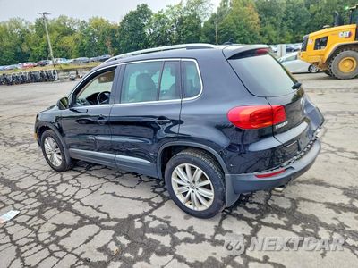 Drugie zdjęcie samochodu z przodu: 2014 VOLKSWAGEN TIGUAN S VIN:WVGBV3AXXEW525008 - miniatura