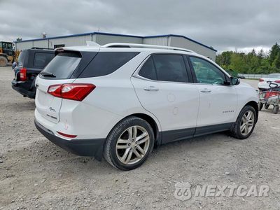 Trzecie zdjęcie samochodu z tyłu: 2018 CHEVROLET EQUINOX PREMIER VIN:3GNAXVEV6JL391216 - miniatura