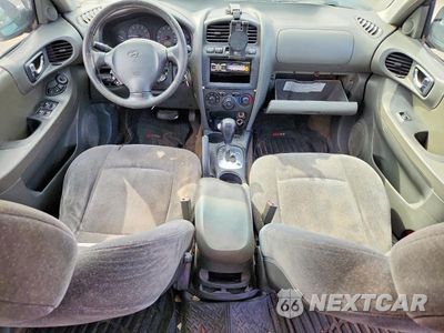 Zdjęcie 8 z 13 samochodu: 2004 HYUNDAI SANTA FE GLS VIN:KM8SC13D54U739170 - miniatura