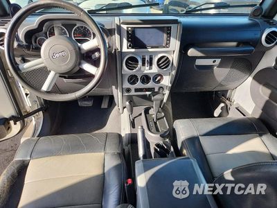 Zdjęcie 8 z 12 samochodu: 2008 JEEP WRANGLER UNLIMITED SAHARA VIN:1J8GA59198L652431 - miniatura