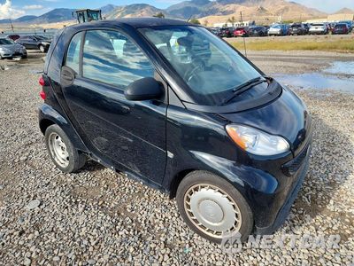 Czwarte zdjęcie samochodu z boku: 2013 SMART FORTWO PURE VIN:WMEEJ3BAXDK597230 - miniatura