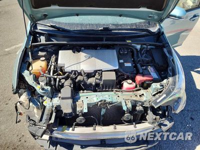 Zdjęcie 11 z 12 samochodu: 2017 TOYOTA PRIUS TWO VIN:JTDKBRFUXH3043434 - miniatura