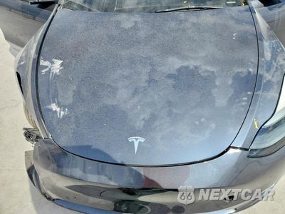 Zdjęcie 11 z 13 samochodu: 2023 TESLA MODEL Y VIN:7SAYGDEE9PA168192 - miniatura