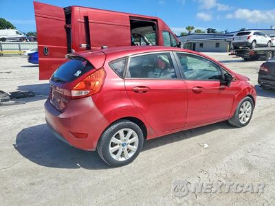 Trzecie zdjęcie samochodu z tyłu: 2011 FORD FIESTA SE VIN:3FADP4EJ2BM124640 - miniatura