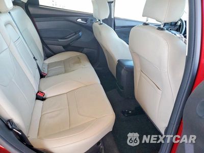 Zdjęcie 10 z 12 samochodu: 2016 FORD FOCUS TITANIUM VIN:1FADP3J28GL287763 - miniatura