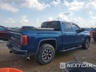 Trzecie zdjęcie samochodu z tyłu: 2017 GMC SIERRA K1500 SLT VIN:3GTU2NEJ7HG392329 - miniatura