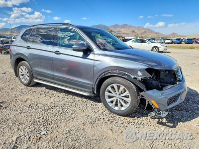 Czwarte zdjęcie samochodu z boku: 2018 VOLKSWAGEN TIGUAN S VIN:3VV0B7AX9JM094961 - miniatura