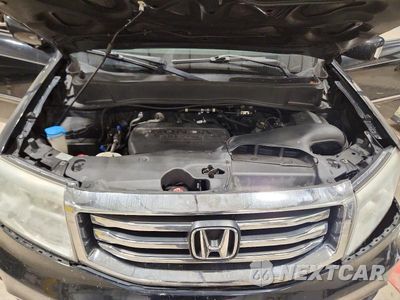 Zdjęcie 12 z 13 samochodu: 2013 HONDA PILOT TOURING VIN:5FNYF4H96DB022880 - miniatura