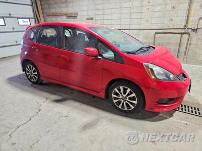 Czwarte zdjęcie samochodu z boku: 2013 HONDA FIT SPORT VIN:JHMGE8H58DC072176 - miniatura