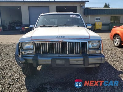 Piąte zdjęcie samochodu w środku: 1991 JEEP CHEROKEE LAREDO VIN:1J4FJ58S8ML639137 - miniatura