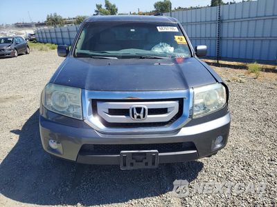 Piąte zdjęcie samochodu w środku: 2011 HONDA PILOT EXL VIN:5FNYF4H58BB034006 - miniatura