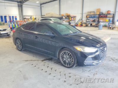 Czwarte zdjęcie samochodu z boku: 2018 HYUNDAI ELANTRA SPORT VIN:KMHD04LB0JU479144 - miniatura