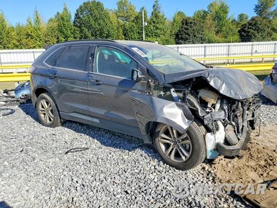 Czwarte zdjęcie samochodu z boku: 2017 FORD EDGE SEL VIN:2FMPK3J87HBB50806 - miniatura