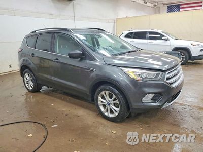 Czwarte zdjęcie samochodu z boku: 2017 FORD ESCAPE SE VIN:1FMCU9GD1HUC09763 - miniatura