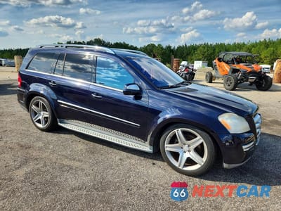 Czwarte zdjęcie samochodu z boku: 2010 MERCEDES-BENZ GL 550 4MATIC VIN:4JGBF8GE5AA614671 - miniatura