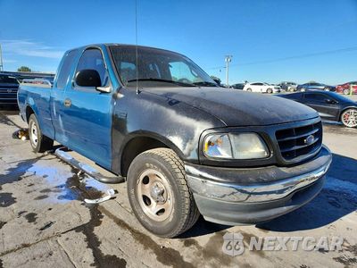 Czwarte zdjęcie samochodu z boku: 2000 FORD F150 XL VIN:1FTZX1722YNA71358 - miniatura