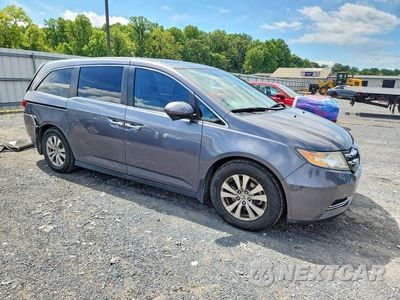 Czwarte zdjęcie samochodu z boku: 2014 HONDA ODYSSEY EXL VIN:5FNRL5H63EB020899 - miniatura