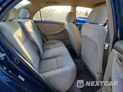 Zdjęcie 10 z 12 samochodu: 2004 TOYOTA COROLLA CE VIN:1NXBR32E64Z324072 - miniatura