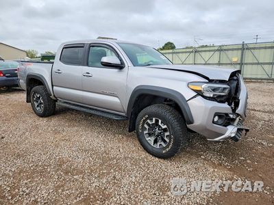 Czwarte zdjęcie samochodu z boku: 2021 TOYOTA TACOMA TRD OFF-ROAD VIN:3TYCZ5AN6MT016396 - miniatura