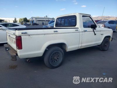 Trzecie zdjęcie samochodu z tyłu: 1984 FORD RANGER VIN:1FTBR10AXEUD44870 - miniatura