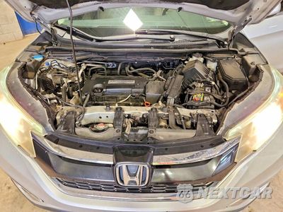 Zdjęcie 12 z 13 samochodu: 2015 HONDA CR-V EXL VIN:2HKRM4H72FH673159 - miniatura