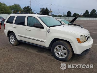 Czwarte zdjęcie samochodu z boku: 2010 JEEP GRAND CHEROKEE LAREDO VIN:1J4PR4GK6AC120284 - miniatura