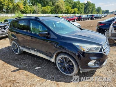 Czwarte zdjęcie samochodu z boku: 2017 FORD ESCAPE SE VIN:1FMCU0GD3HUC33140 - miniatura