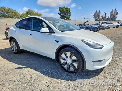 Czwarte zdjęcie samochodu z boku: 2023 TESLA MODEL Y VIN:7SAYGDEE3PA188132 - miniatura