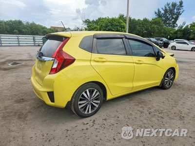 Trzecie zdjęcie samochodu z tyłu: 2015 HONDA FIT EX VIN:3HGGK5H85FM725200 - miniatura
