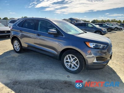 Czwarte zdjęcie samochodu z boku: 2023 FORD EDGE SEL VIN:2FMPK4J94PBA25937 - miniatura