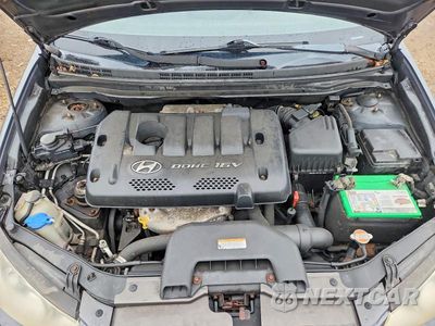 Zdjęcie 11 z 12 samochodu: 2007 HYUNDAI ELANTRA GLS VIN:KMHDU46D27U121893 - miniatura