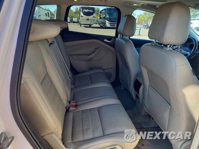 Zdjęcie 10 z 12 samochodu: 2014 FORD ESCAPE TITANIUM VIN:1FMCU0J97EUB64601 - miniatura