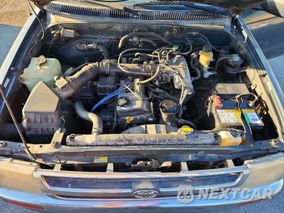Zdjęcie 11 z 12 samochodu: 1997 TOYOTA TACOMA BASE VIN:4TAVL52N0VZ308173 - miniatura