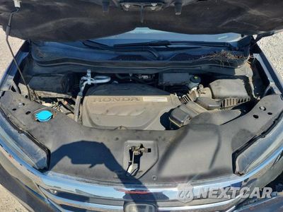 Zdjęcie 12 z 13 samochodu: 2018 HONDA PILOT EX VIN:5FNYF6H46JB014080 - miniatura