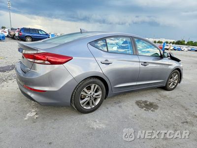 Trzecie zdjęcie samochodu z tyłu: 2018 HYUNDAI ELANTRA VALUE EDITION VIN:5NPD84LF9JH258930 - miniatura