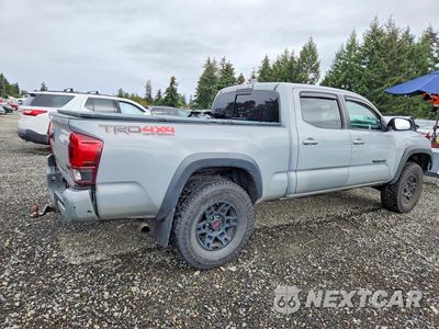 Trzecie zdjęcie samochodu z tyłu: 2019 TOYOTA TACOMA TRD OFF-ROAD VIN:3TMDZ5BN5KM069280 - miniatura