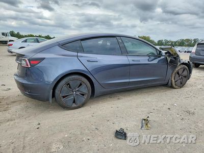 Trzecie zdjęcie samochodu z tyłu: 2021 TESLA MODEL 3 VIN:5YJ3E1ECXMF083354 - miniatura
