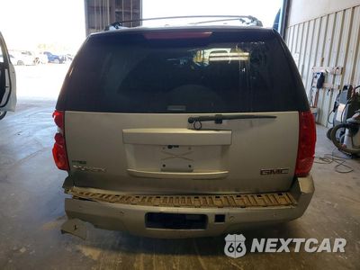 Zdjęcie 6 z 13 samochodu: 2011 GMC YUKON SLE VIN:1GKS1AE09BR127854 - miniatura