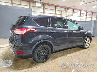 Trzecie zdjęcie samochodu z tyłu: 2014 FORD ESCAPE TITANIUM VIN:1FMCU9J97EUA36492 - miniatura