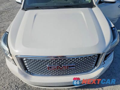 Zdjęcie 12 z 13 samochodu: 2016 GMC YUKON XL DENALI VIN:1GKS2HKJ8GR354883 - miniatura