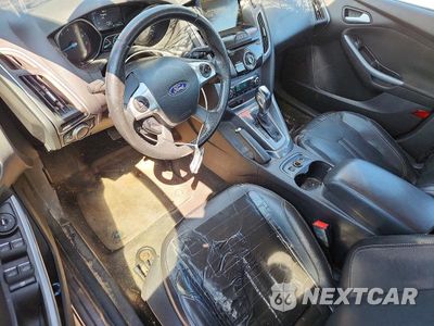 Zdjęcie 8 z 12 samochodu: 2014 FORD FOCUS TITANIUM VIN:1FADP3J26EL399958 - miniatura