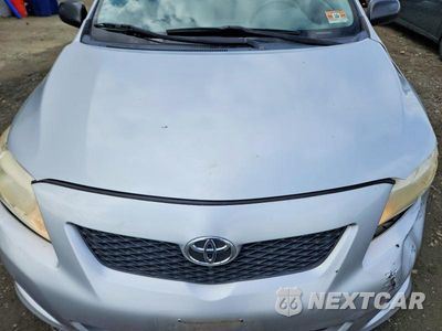Zdjęcie 11 z 12 samochodu: 2009 TOYOTA COROLLA BASE VIN:JTDBL40E099071825 - miniatura
